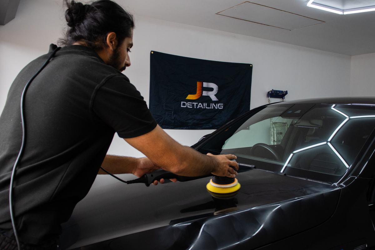 Stage Two paint correction — machine polishing a bonnet